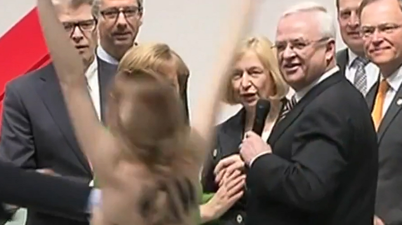 Illustration for article titled VW's CEO Looked Pretty Happy About Those Topless Protesters